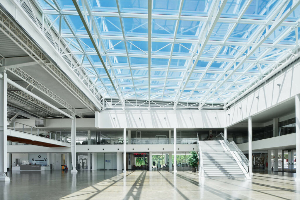 Steel structure lobby with large skylight and bright interior