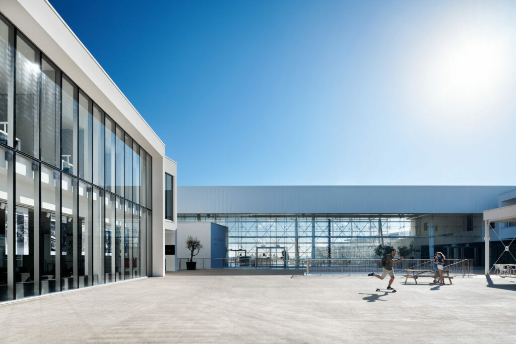 Modern buildings in Carcavelos, Portugal with large glass windows