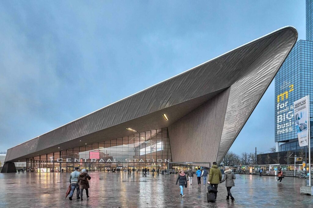 Modern architecture train station in Rotterdam, Netherlands with large cantilever made of metal