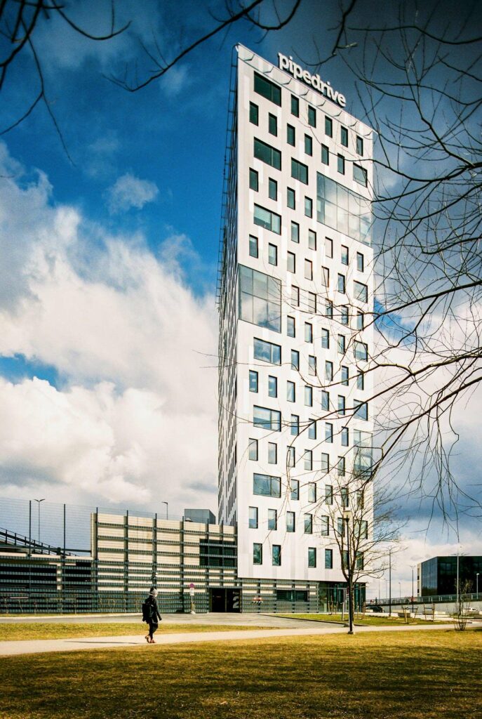 Modern architecture tower in Tartu, Estonia with silver metal cladding and large glass windows