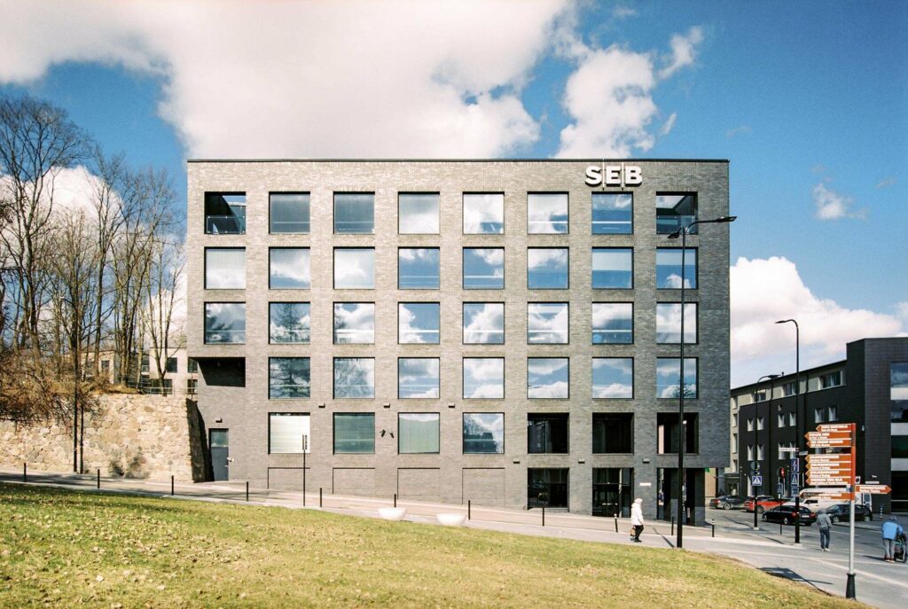 Modern architecture building in Tartu, Estonia with black tiles and rectangular windows